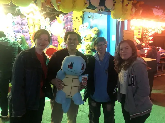 friends hanging out at theme park