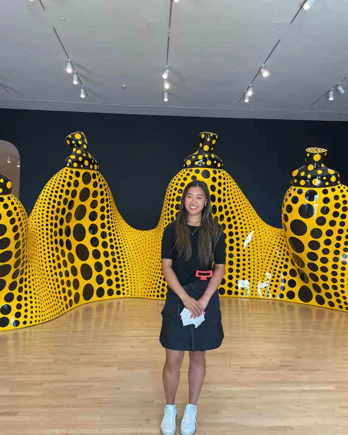 Edie poses for a photo in the Carnegie Museum of Art