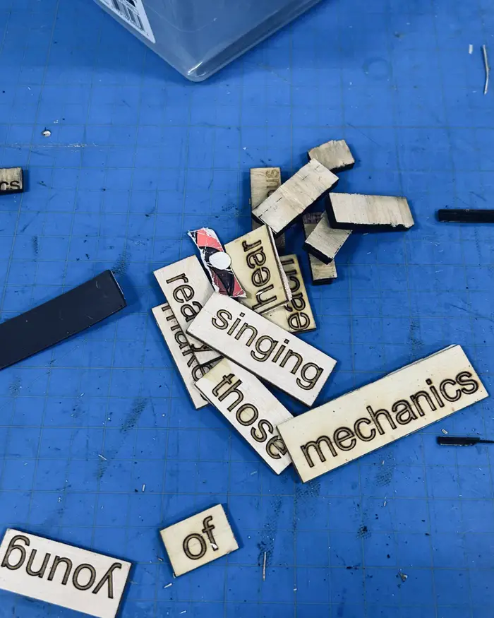 Woodwork tiles with words on them