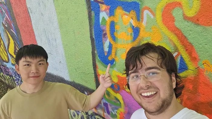 Giancarlo and friend pose for a photo. 