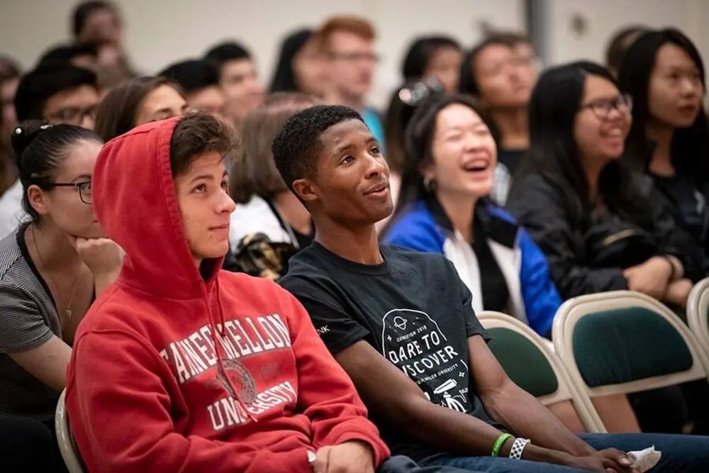 Students listening to a presentation