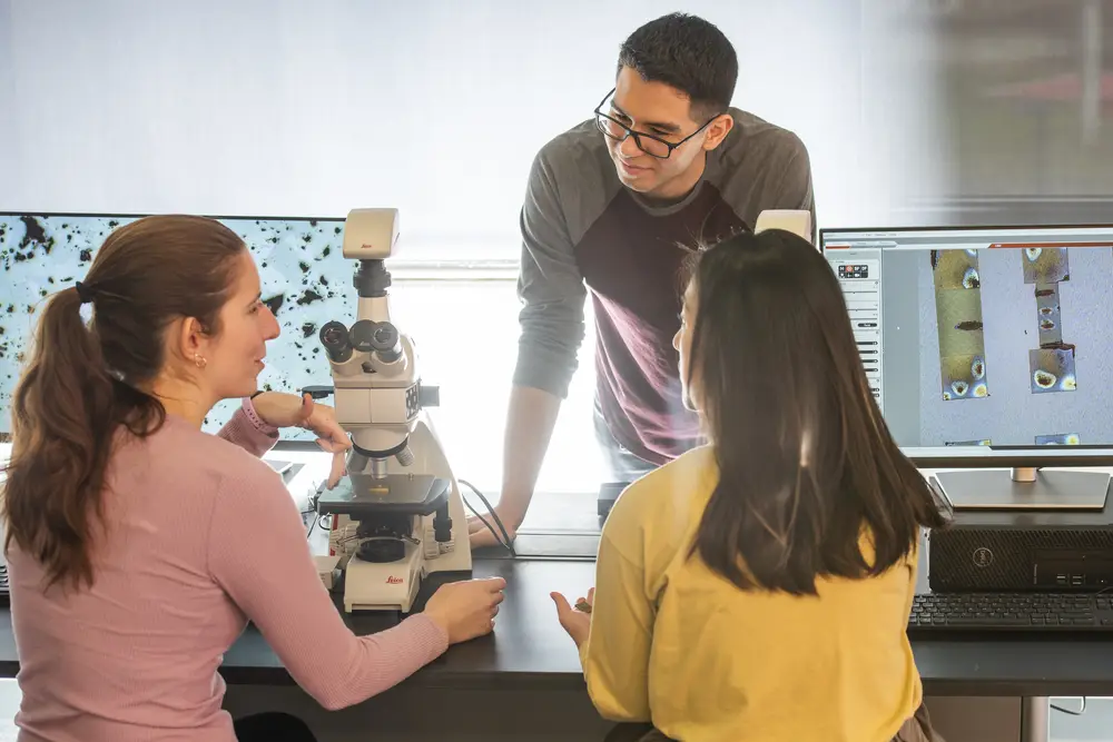Three students in a lab