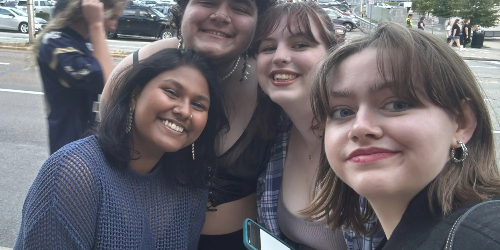Harshitha and friends pose for a photo