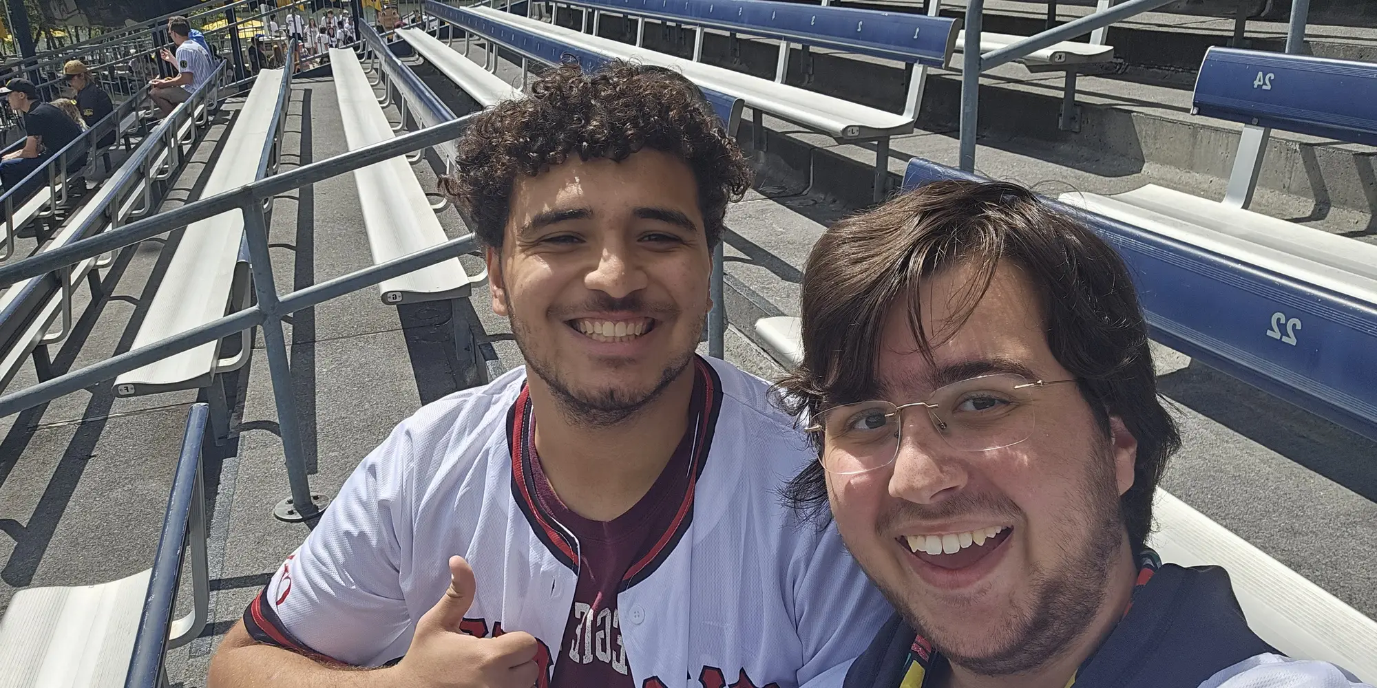 Giancarlo and friend pose for a photo at a Pirates game