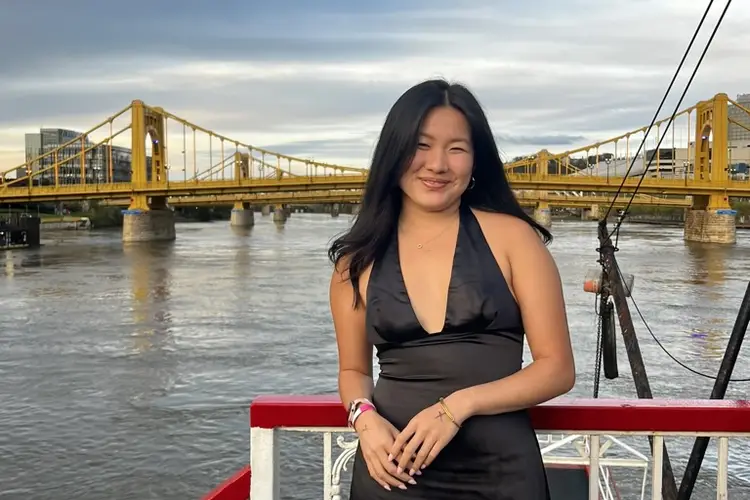 student smiling on gateway clipper fleet