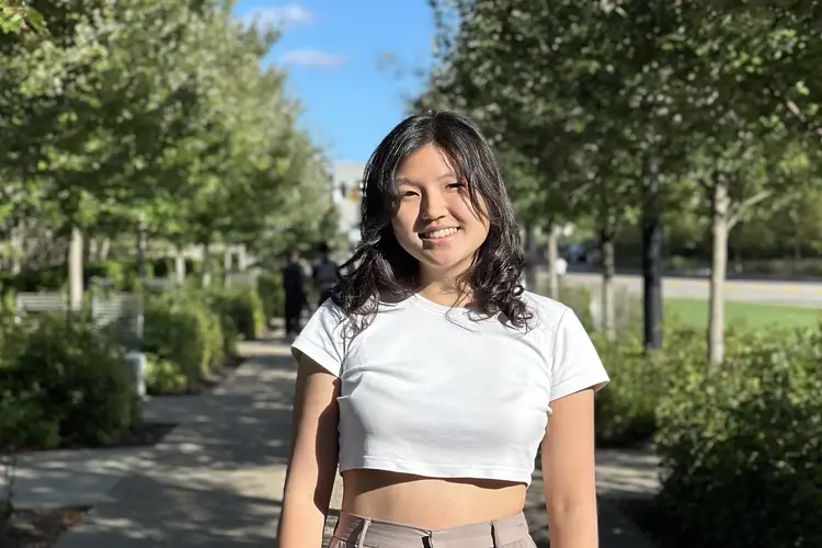 Katherine poses for a photo on campus 