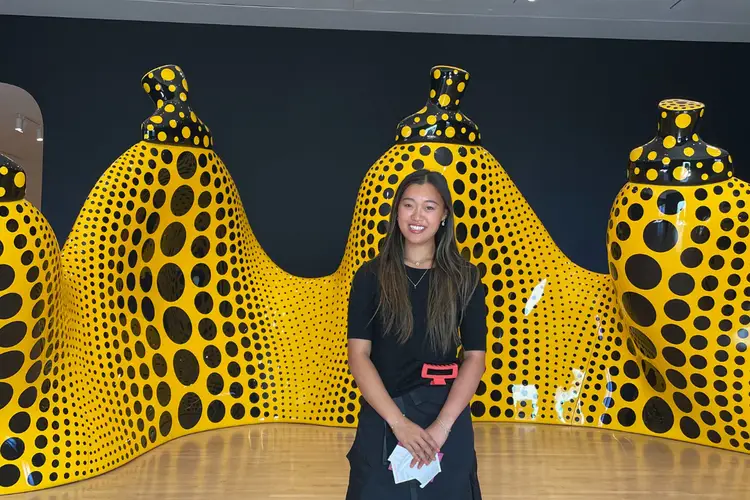 Edie poses for a photo in the Carnegie Museum of Art
