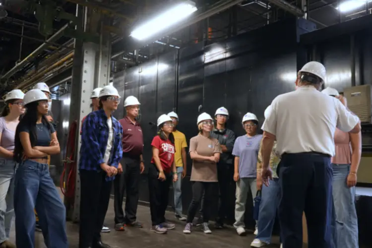 A group of students touring a facility